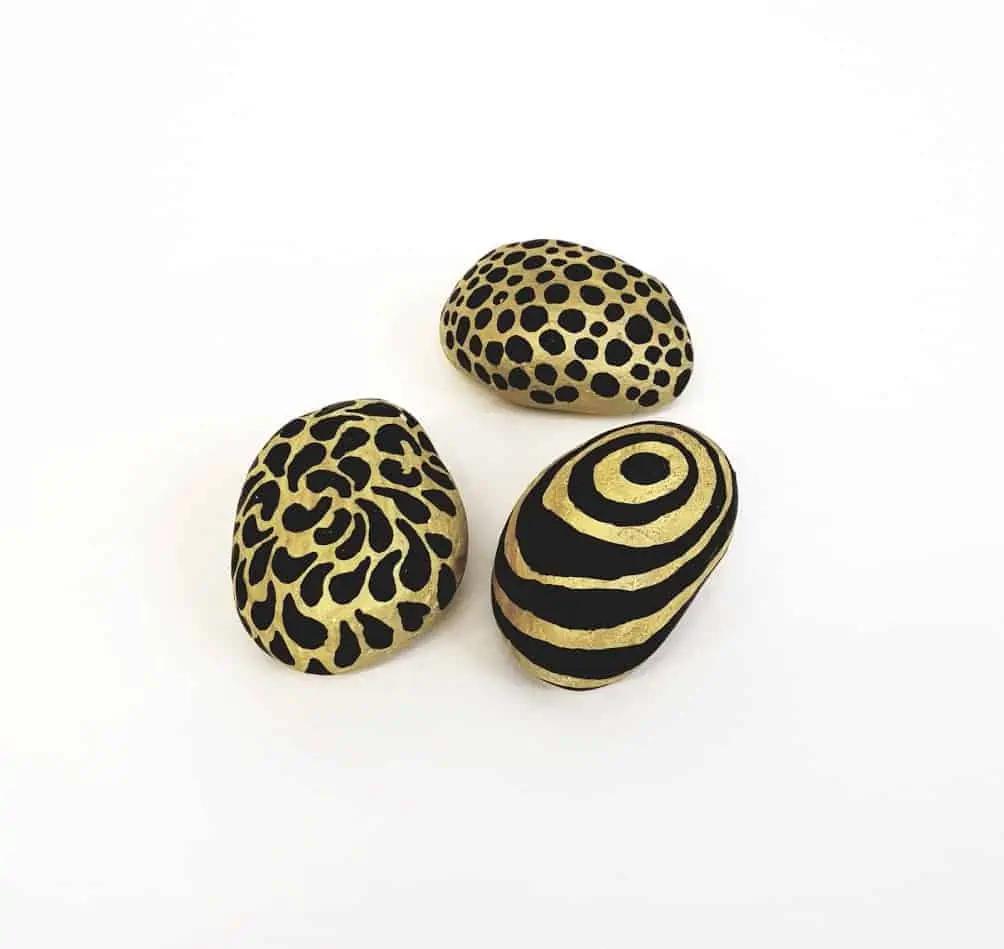 Black And Gold Painted Pebbles