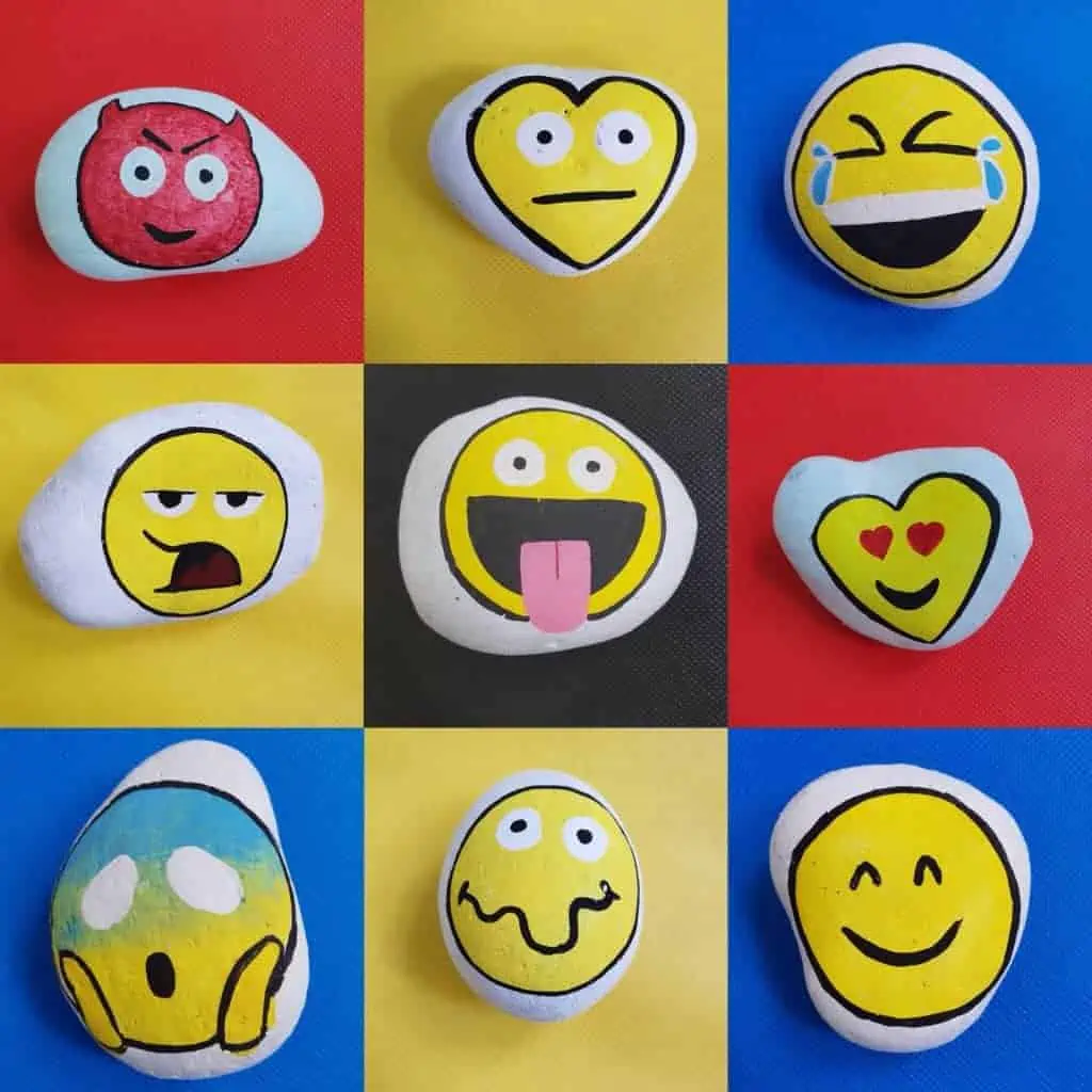 Pebble And Rock Painting Smiley Faces Using Paint Pens
