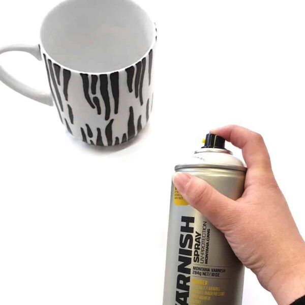 spray varnish your paint pen artwork